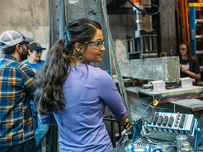 A student works in a materials lab on campus.