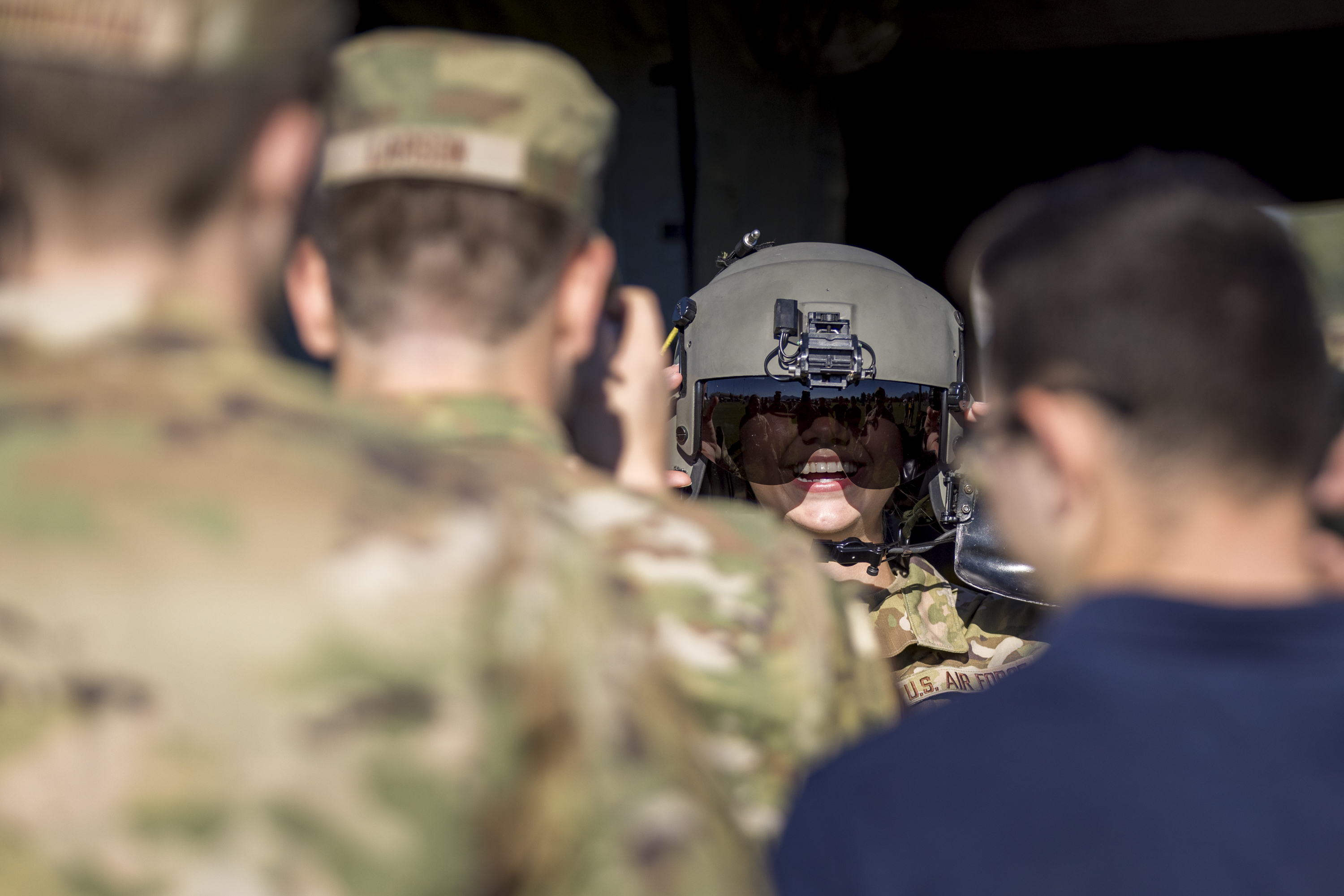 AFROTC Cadet trying on aircrew helmet