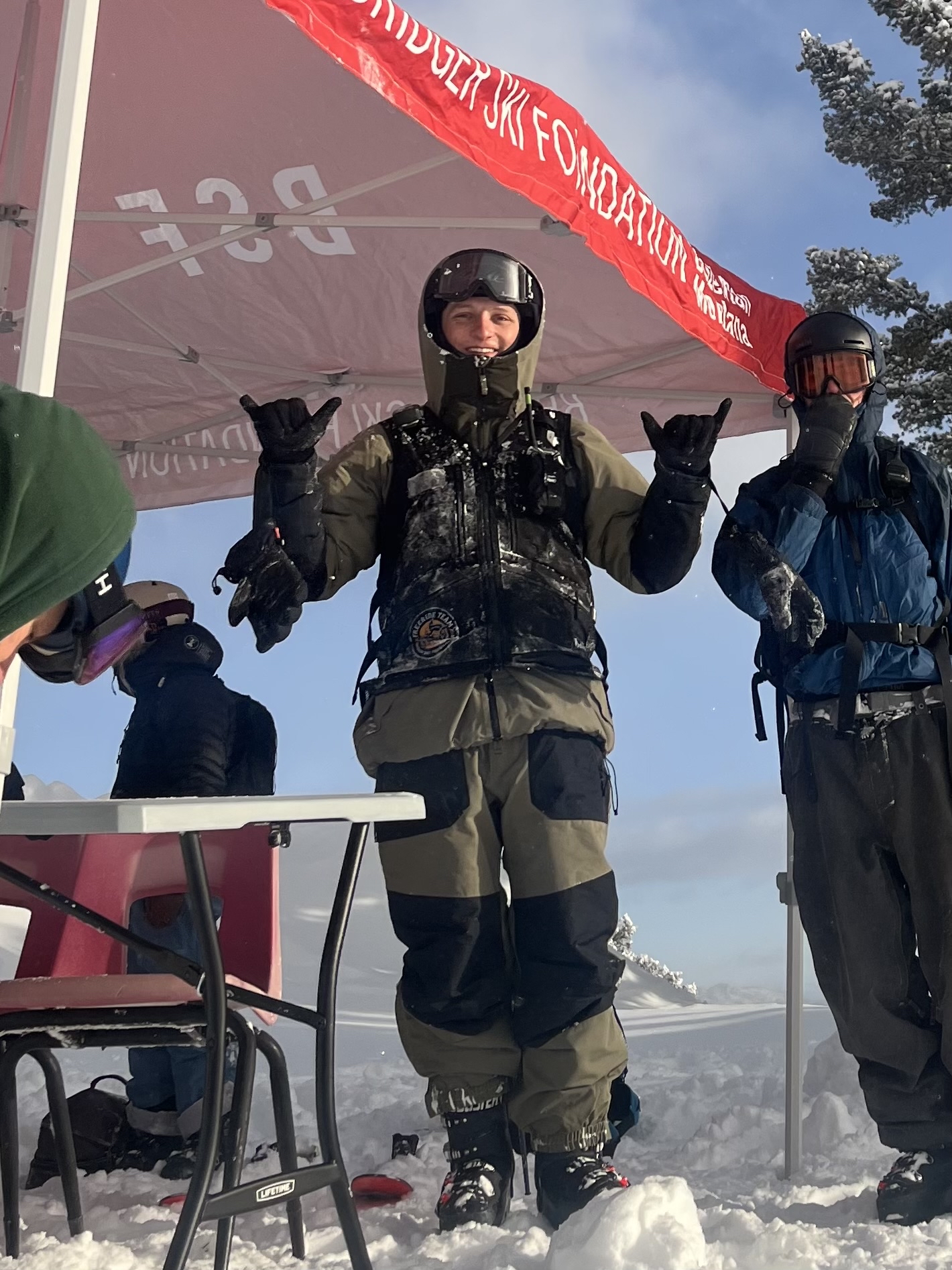 Tommy in ski gear outside in the snow