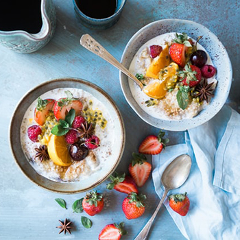 two fruit and yogurt parfait bowls