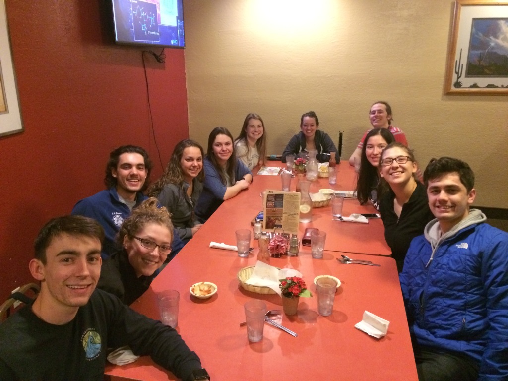 Group sitting at a table waiting to eat a meal