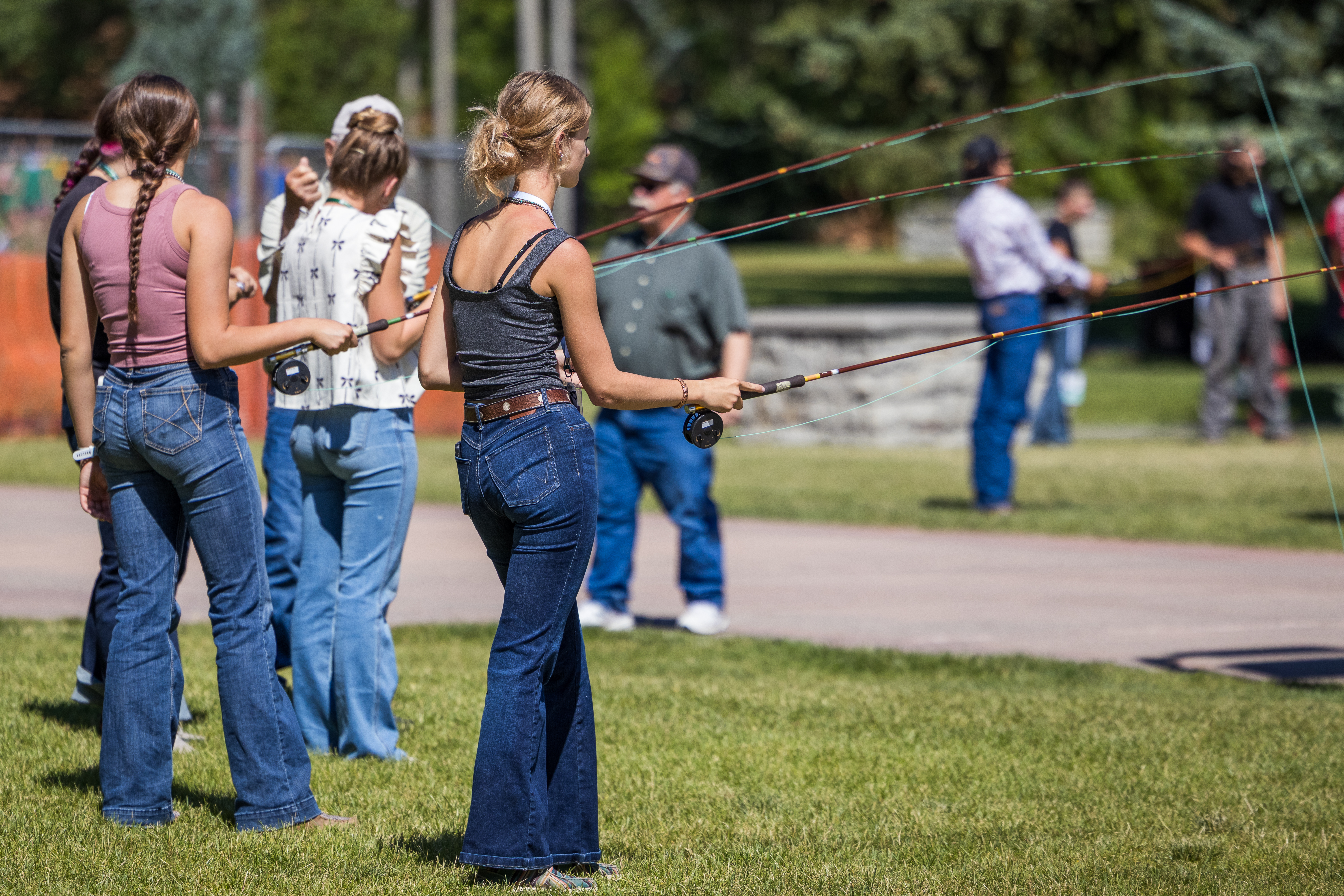 youth practicing fly fishing