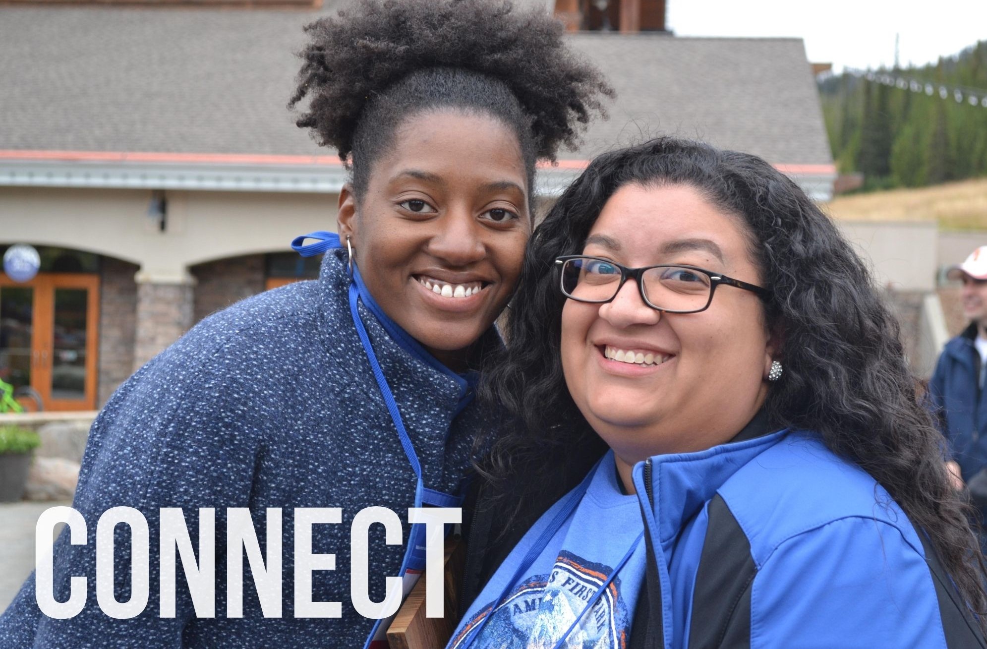 Text: Connect. A female volunteer and club member smile.