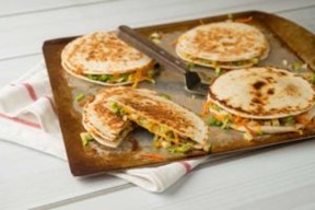 Four Grilled Vegetable Quesadillas on a pan.