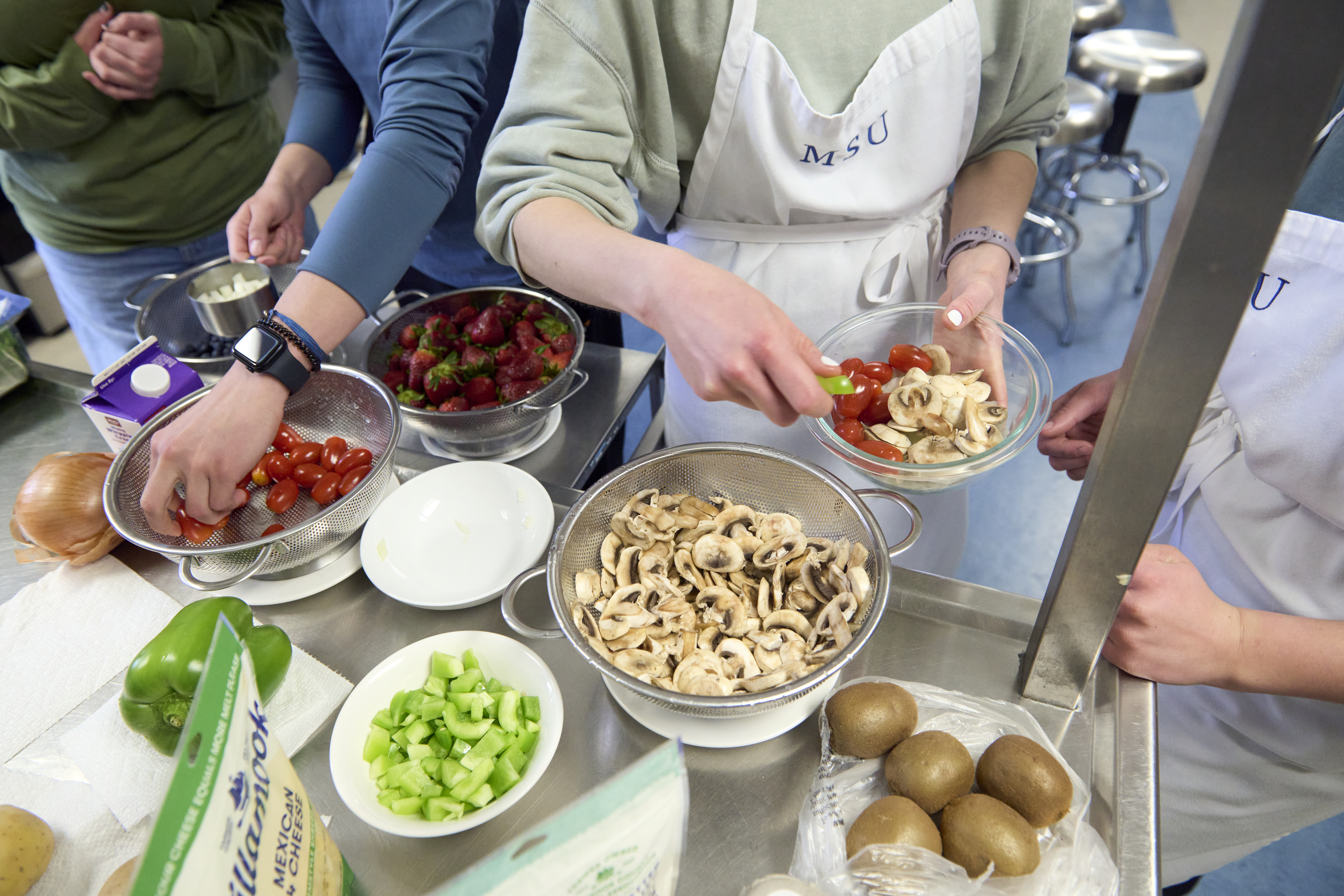 Students using Herrick kitchen