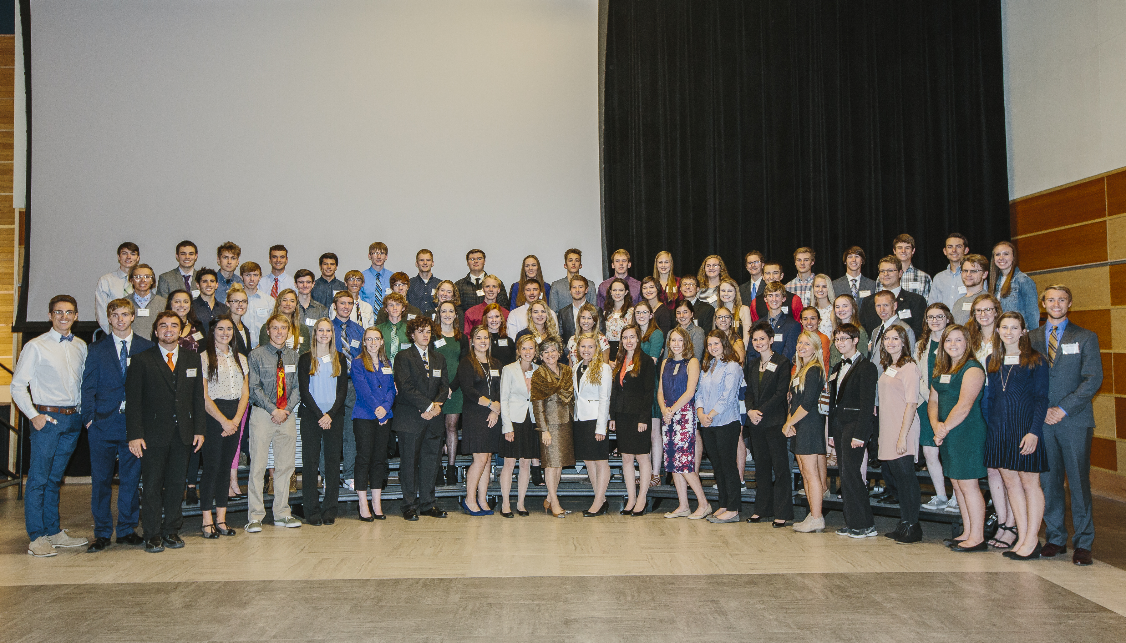 A group of students standing on a stage