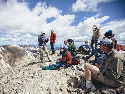 Instructor teaching geology on top of Bridger mountains