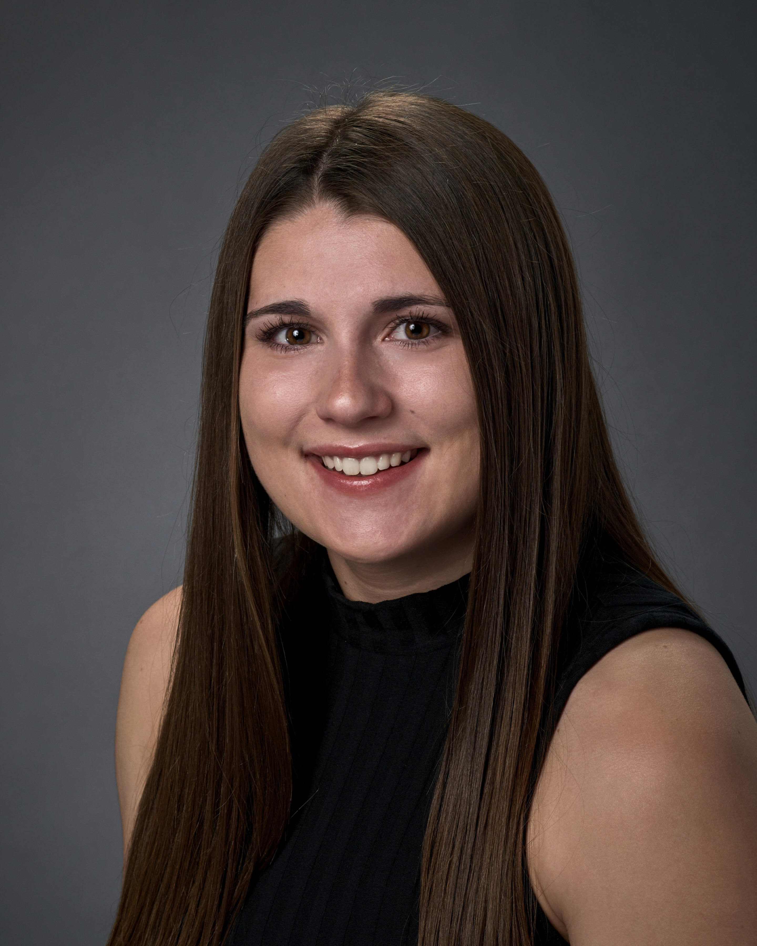 Head shot of Addy Bolton - young female with dark hair and eyes