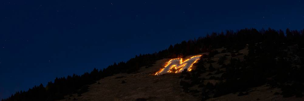 The M lit up at night